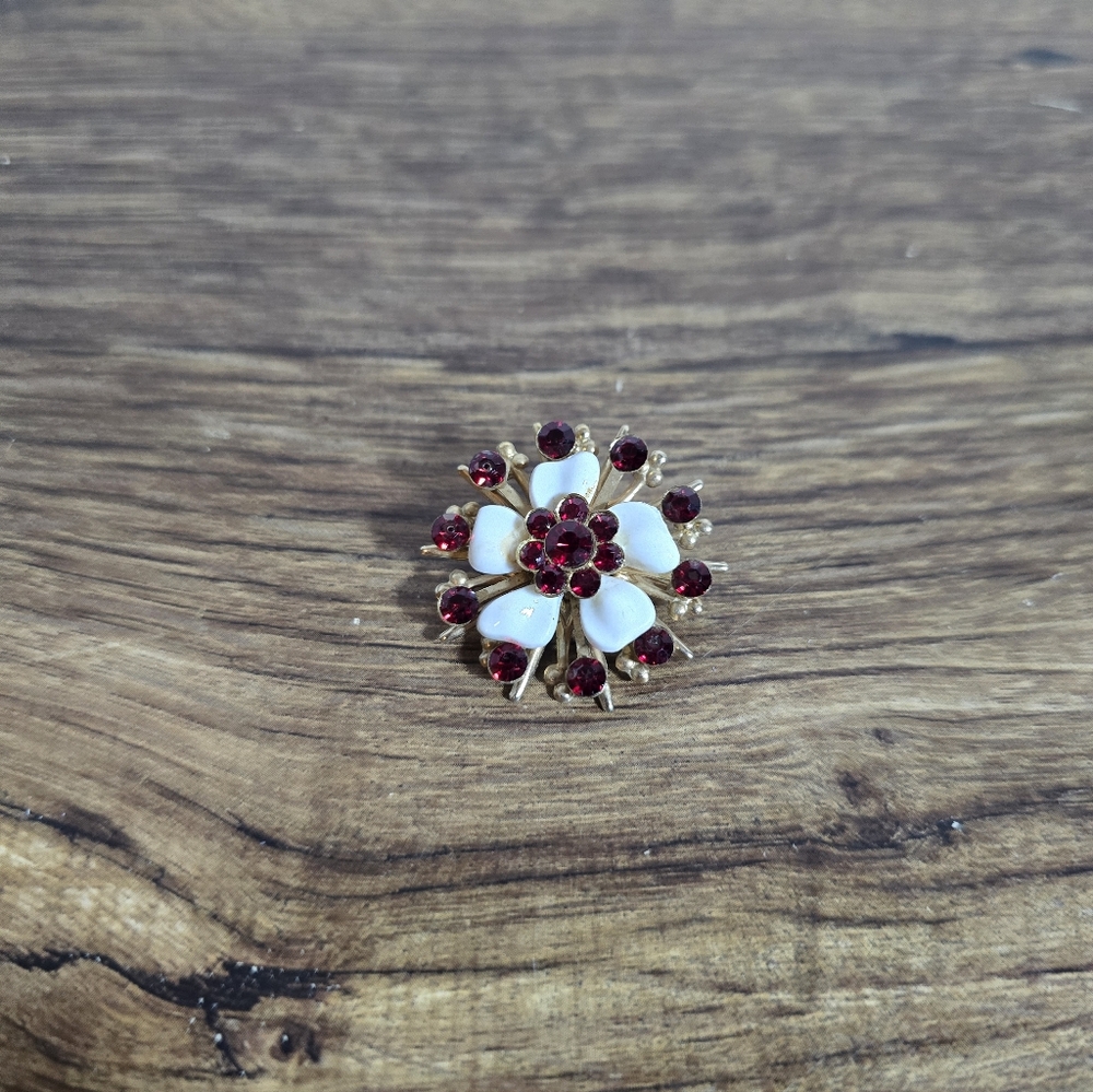 flower brooch with a gold-tone setting